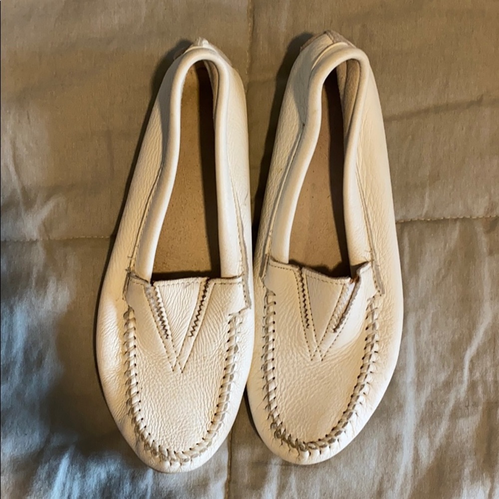 Minnetonka white slip on Moccasins